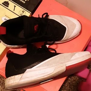 A Greenville Drive sign Jersey and  shoes